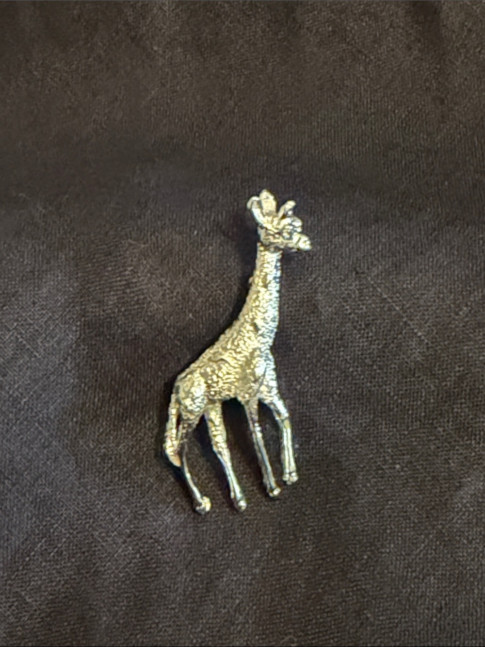 Gerry’s vintage silver giraffe brooch.  Excellent condition. Blue rhinestone eye